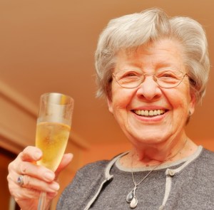 Senior Woman Drinking Champagne 1